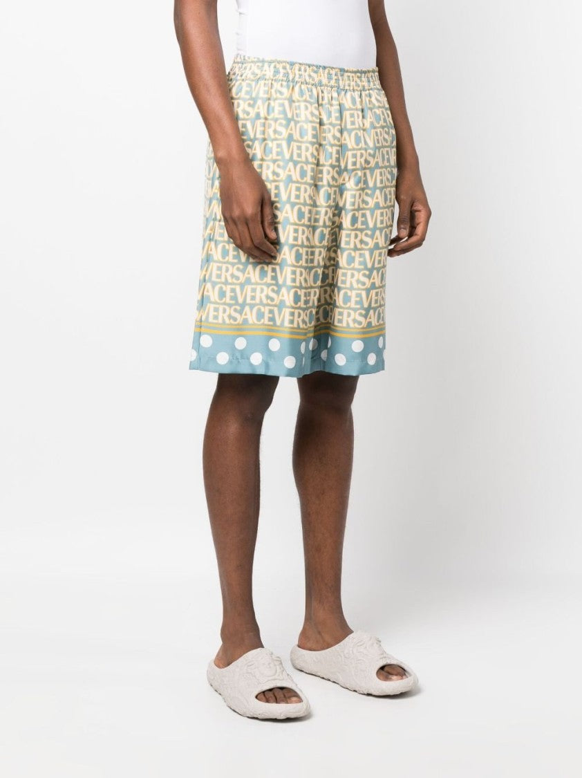 Versace Silk Shorts With All-Over Logo Print