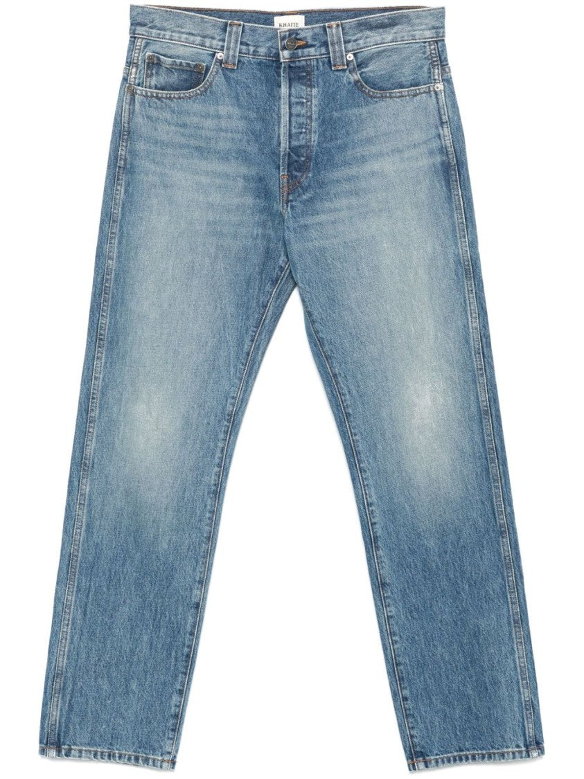 Khaite Relaxed Bow Leg Jeans In Faded Denim
