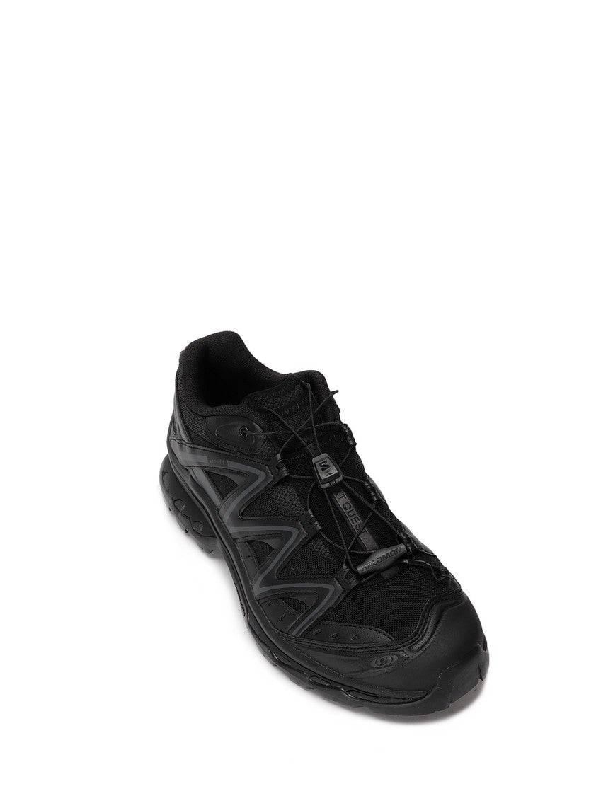 Salomon Streamlined Black Athletic Sneakers With Textured Sole