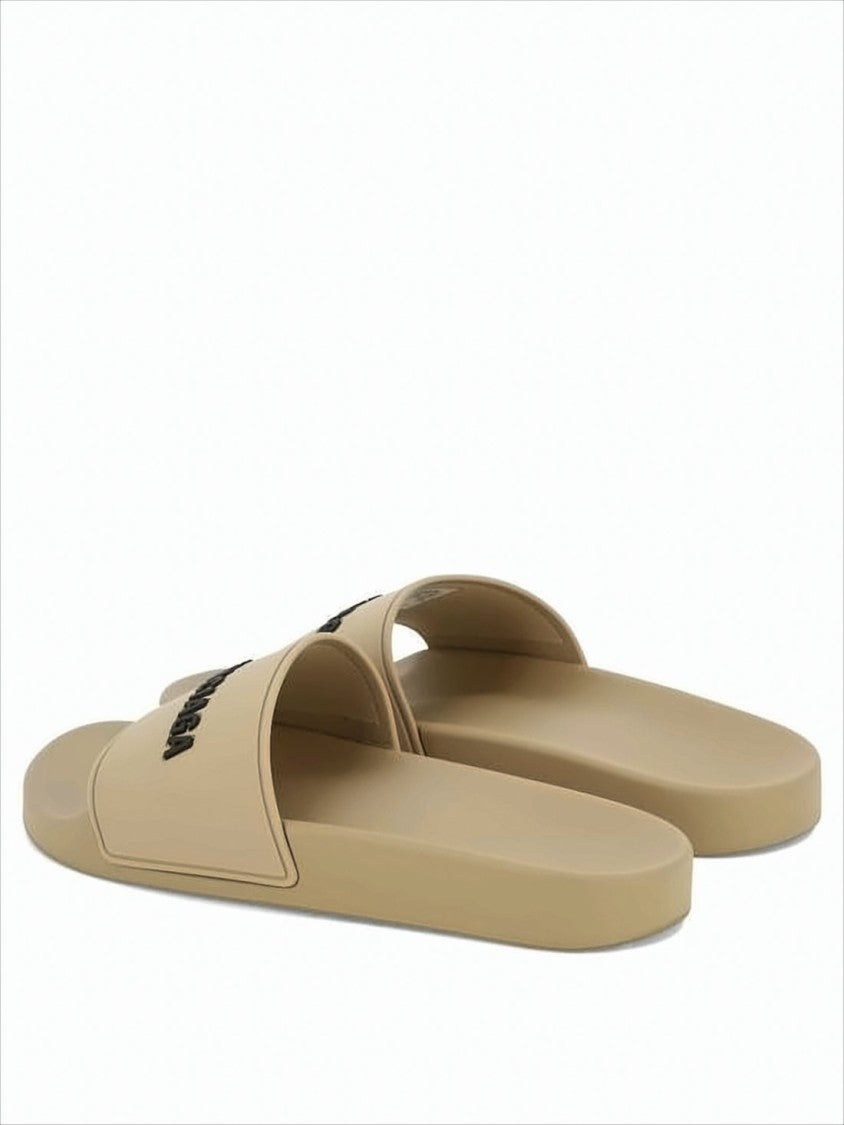 Balenciaga Rubber Slip-On Mules With Textured Sole And Raised Lettering