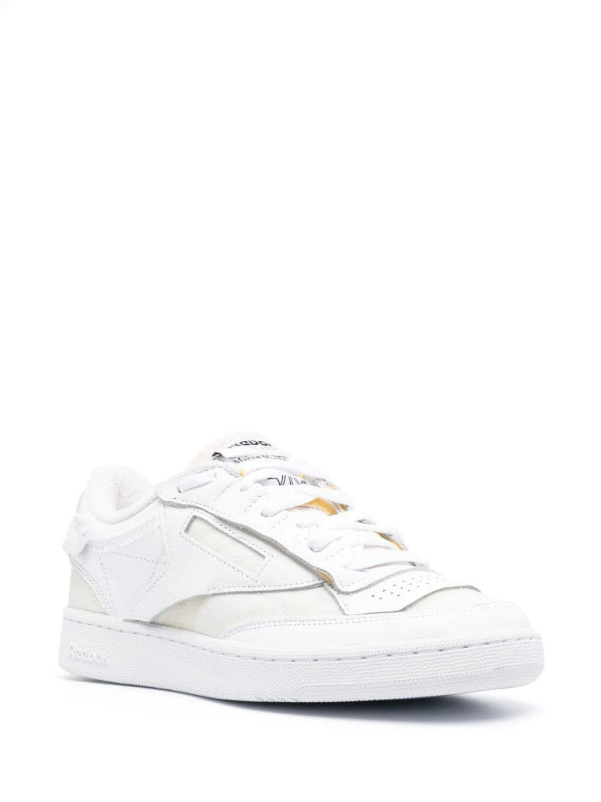 Maison Margiela Minimalist White Leather Low-Top Sneakers With Perforated Detailing
