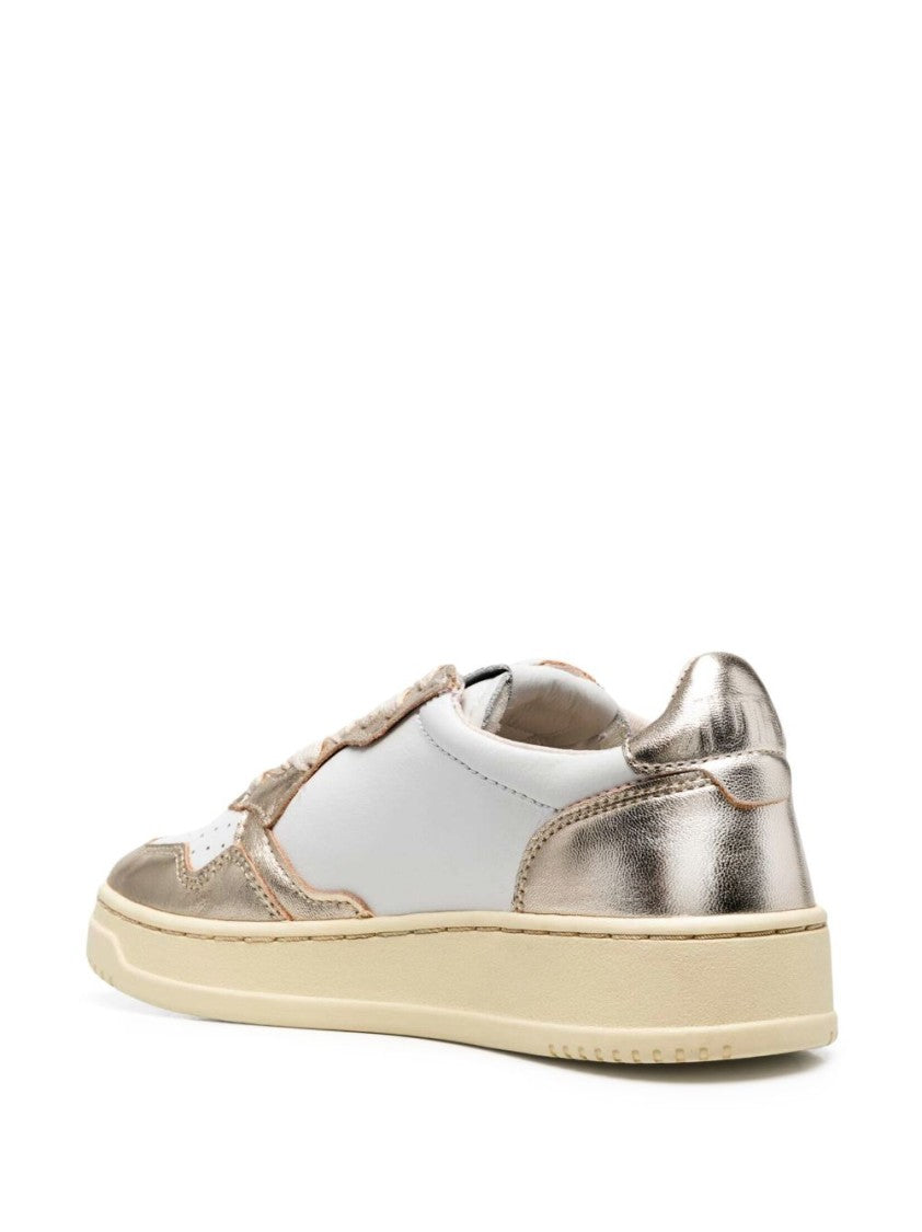 Autry Sleek Sneakers With Metallic Accents And Chunky Sole