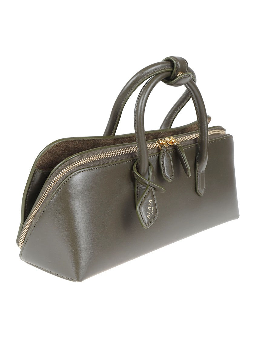 Alaïa Elongated Handbag With Structured Silhouette And Gold-Zip Closure