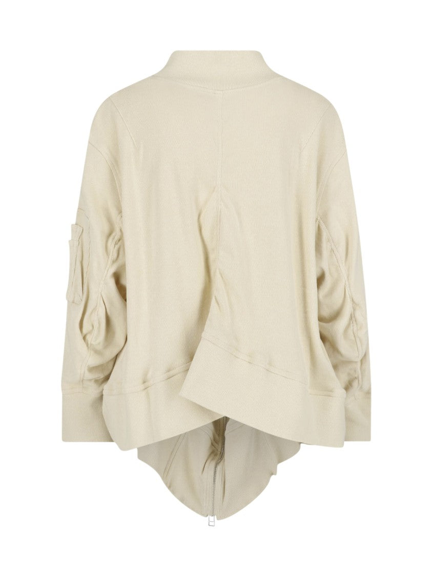 Undercover Asymmetrical Hem Jacket With Utilitarian Pockets