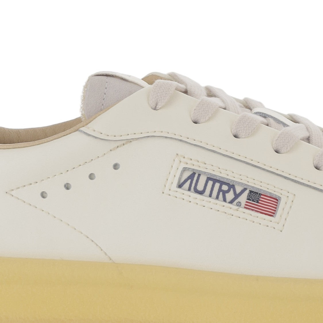 Autry Low-Top Leather Sneakers With Padded Heel And Panel Design