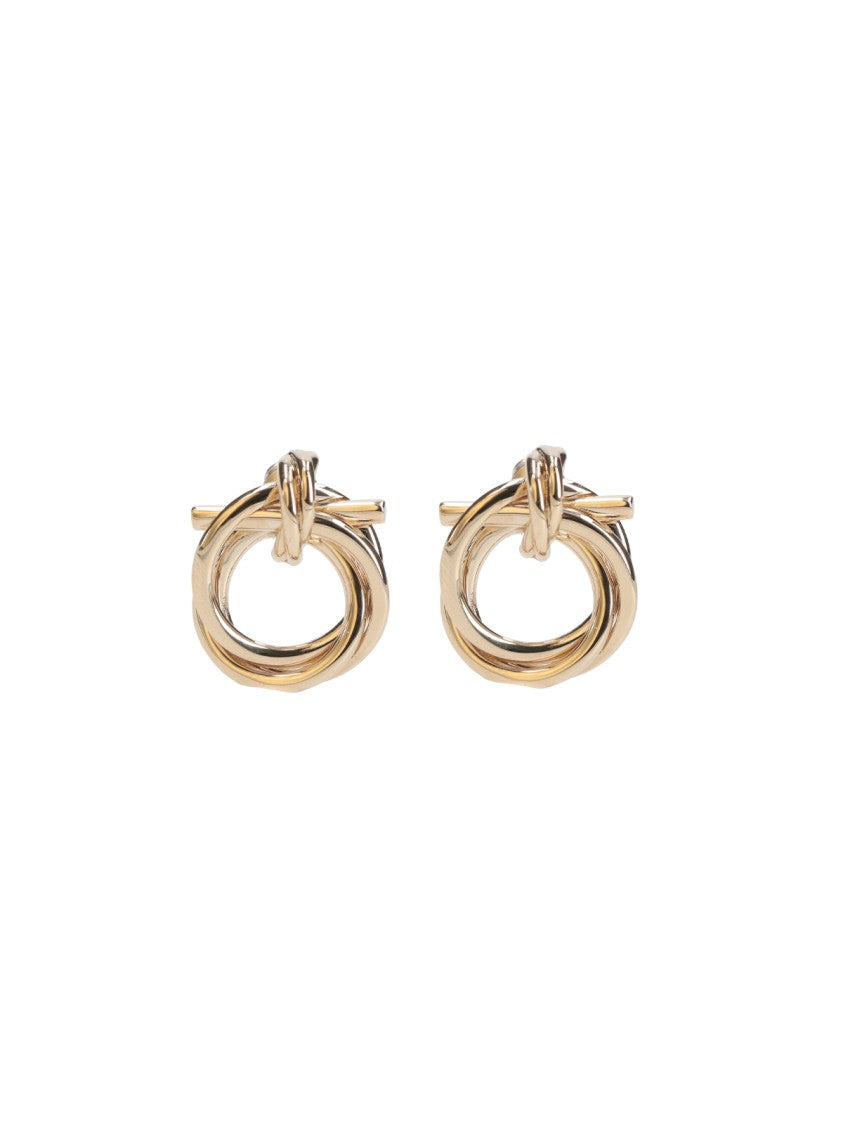 Ferragamo Refined Golden Jewelry With Intricate Embellishments