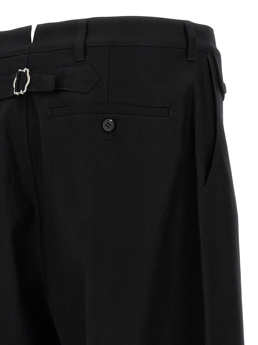 Comme Des Garçons Curved Leg Trousers With Knee Pincer Detail And Adjustable Back Strap
