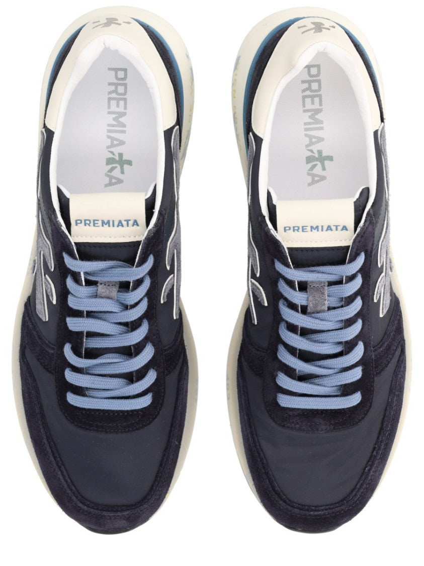 Premiata Dark Base Sneakers With Light Blue Laces And Cream Heel Accent