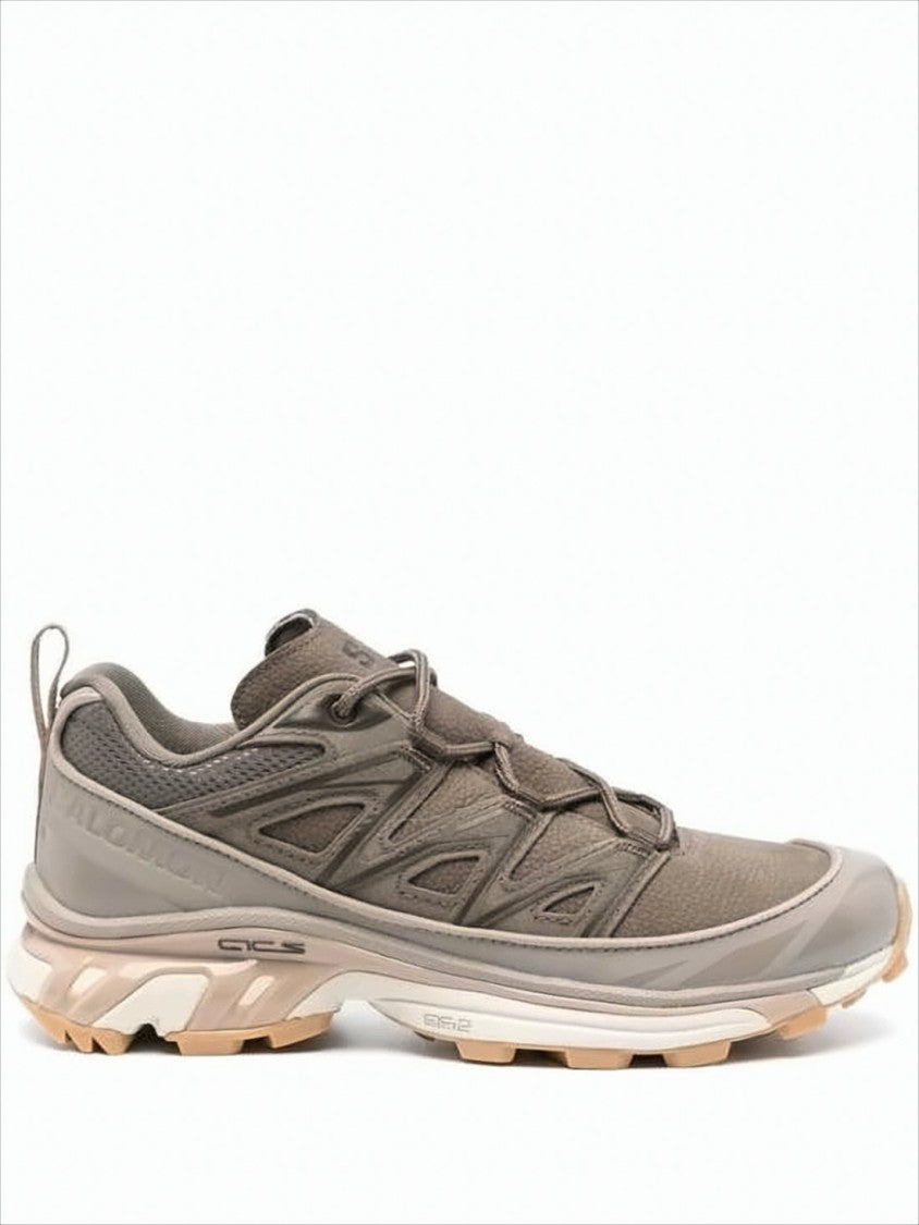 Salomon Streamlined Multitexture Sneakers With Supportive Cage Overlay