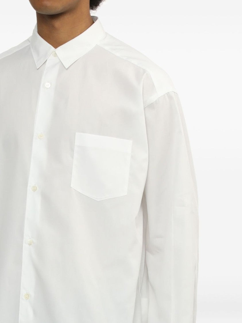 Comme Des Garçons Long-Sleeved White Shirt With Classic Button Design And Pleat Detailing