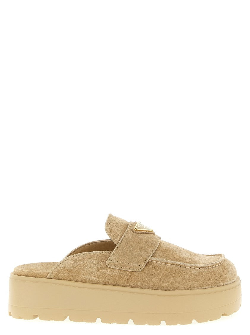 Prada Suede Sabots With Enameled Triangle Logo
