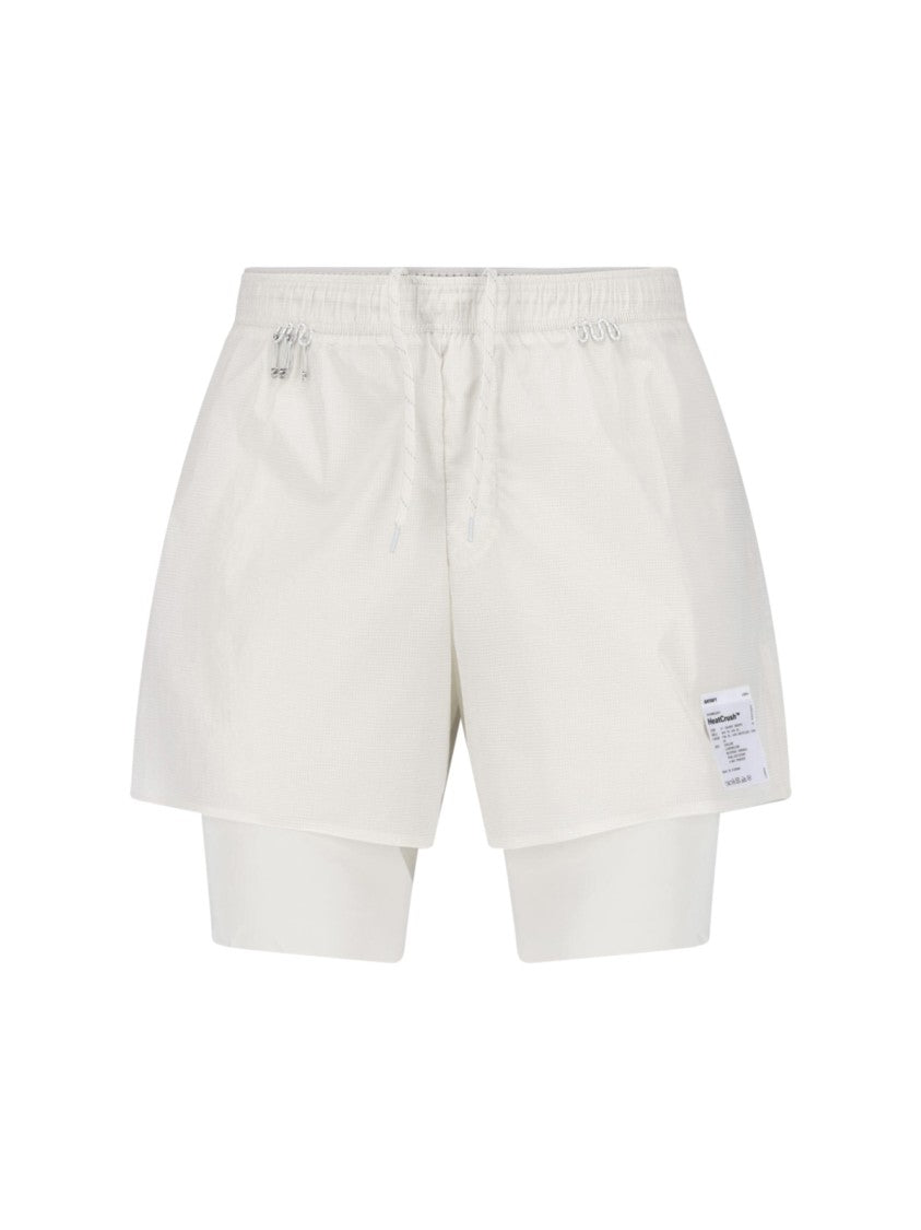 Satisfy Layered White Trousers With Utility Details