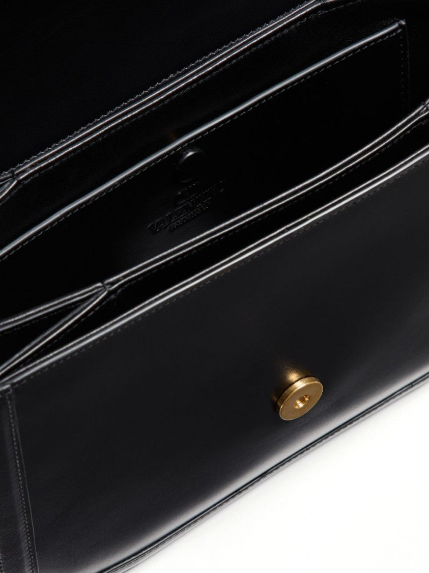 Valentino Garavani Luxurious Black Leather 9To5 Shoulder Bag With Chain Handles