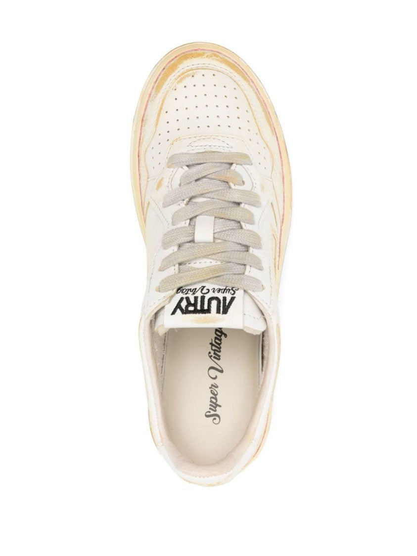 Autry Low-Top Sneakers With Distressed Finish And Perforated Detailing