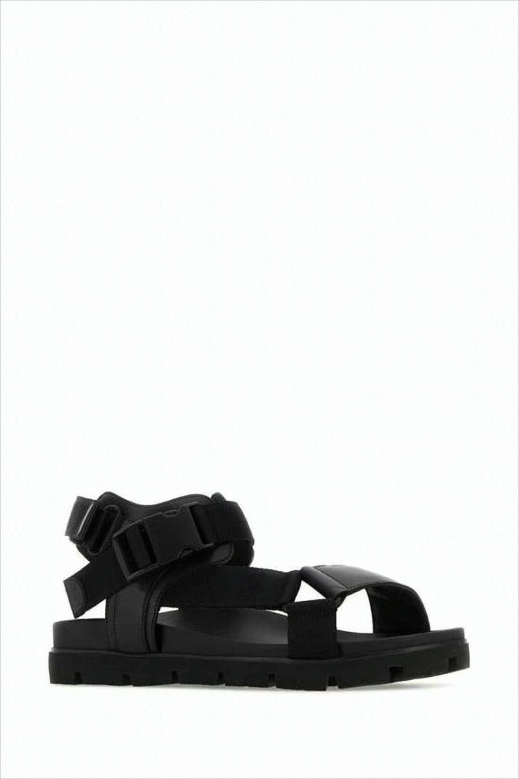 Prada Minimalist Black Sandals With Adjustable Straps And Secure Buckle