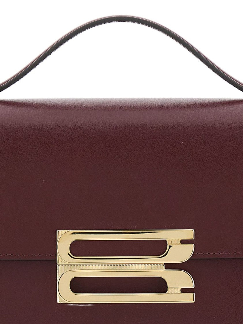 Victoria Beckham Structured Bordeaux Shoulder Bag With Gold-Tone Clasp