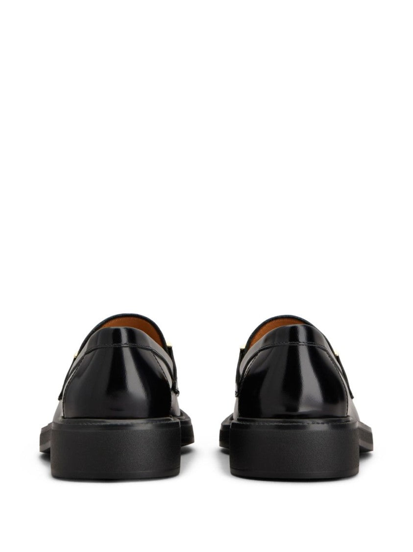 Tod's Black Minimalist Round Toe Slip-On Flats