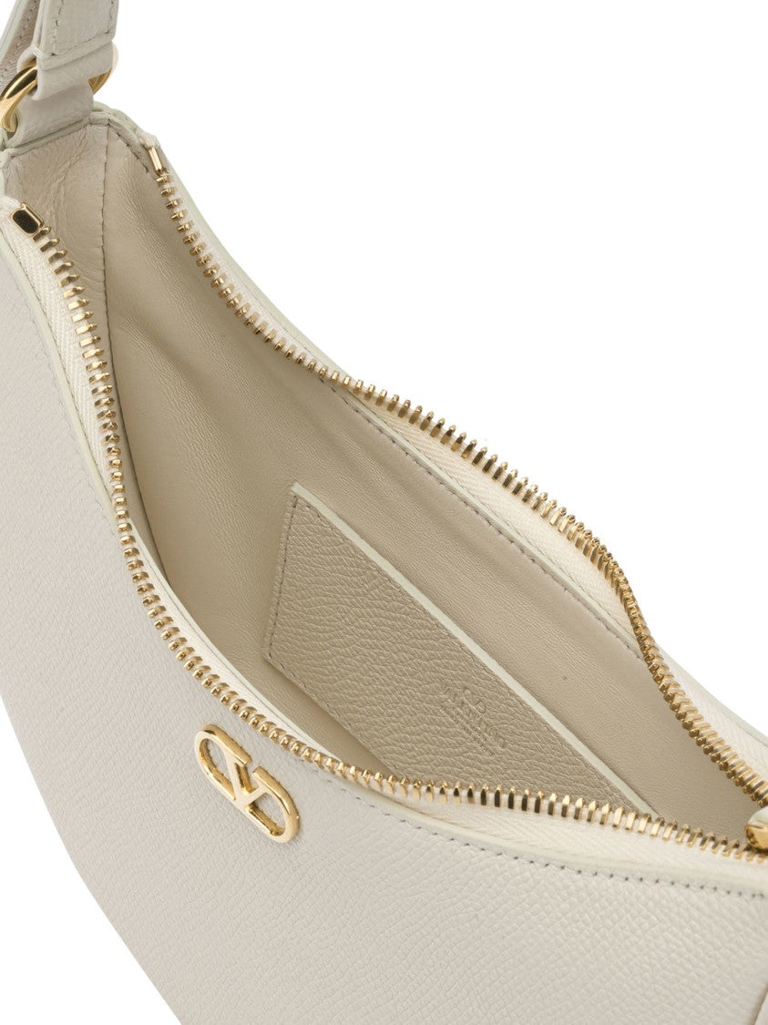 Valentino Garavani Crescent-Shaped White Shoulder Bag In Textured Calf Leather