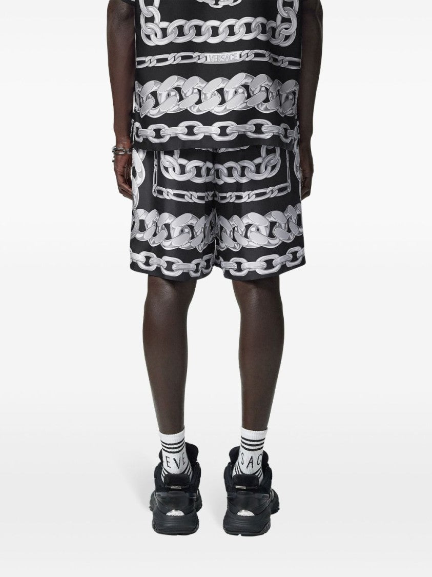 Versace Knee-Length Activewear Shorts With Bold Chain Graphic