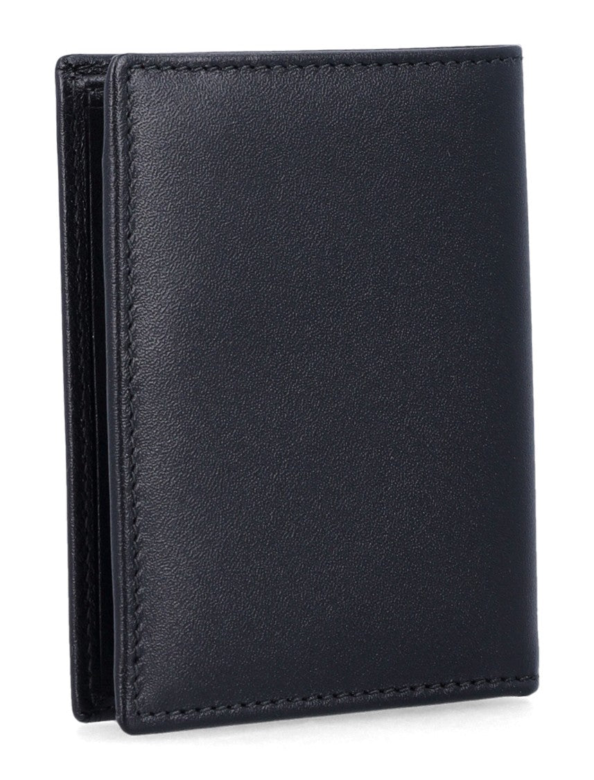 Comme Des Garçons Sleek Black Wallet With Distinctive Silver Accent