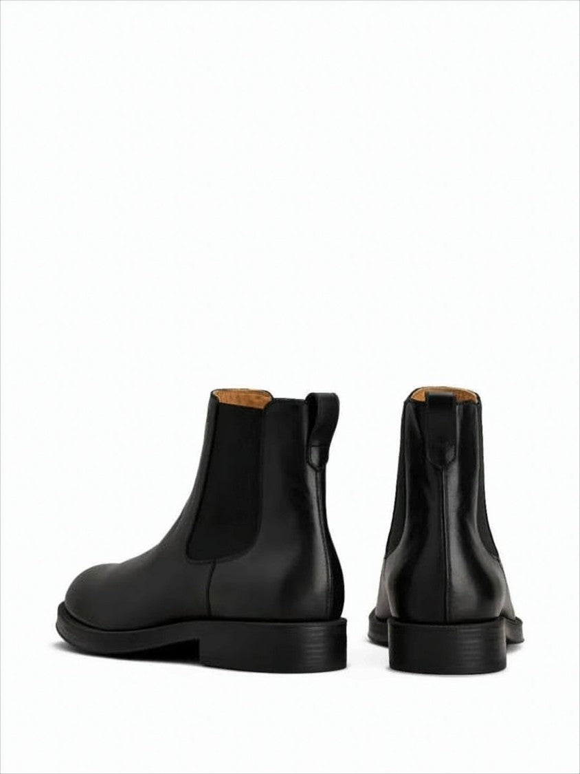 Tod's Black Leather Ankle Boots With Elastic Side Panels And Textured Sole