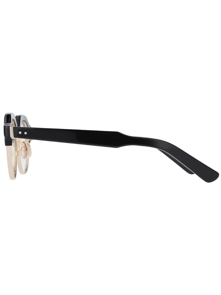 Yellows Plus Optical Frames With Bold Black Front And Metallic Accents