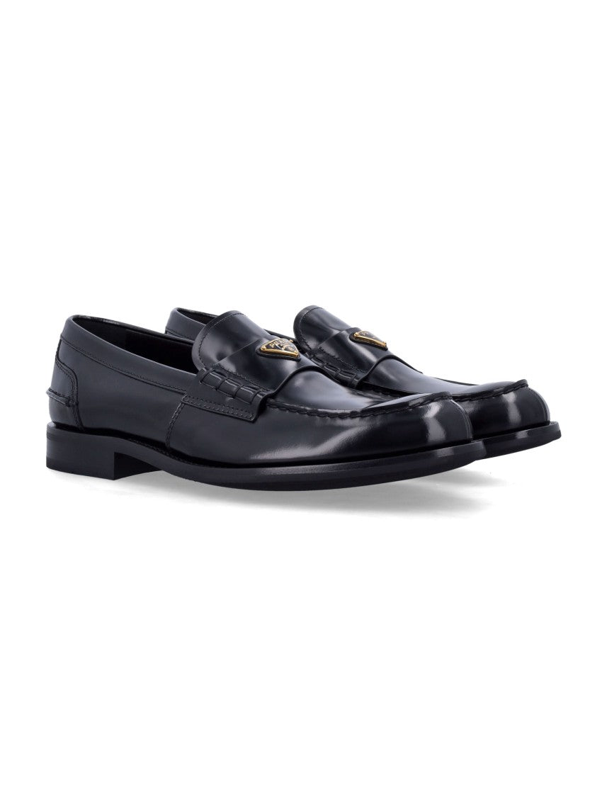 Prada Brushed Leather Loafers With Enameled Metal Logo