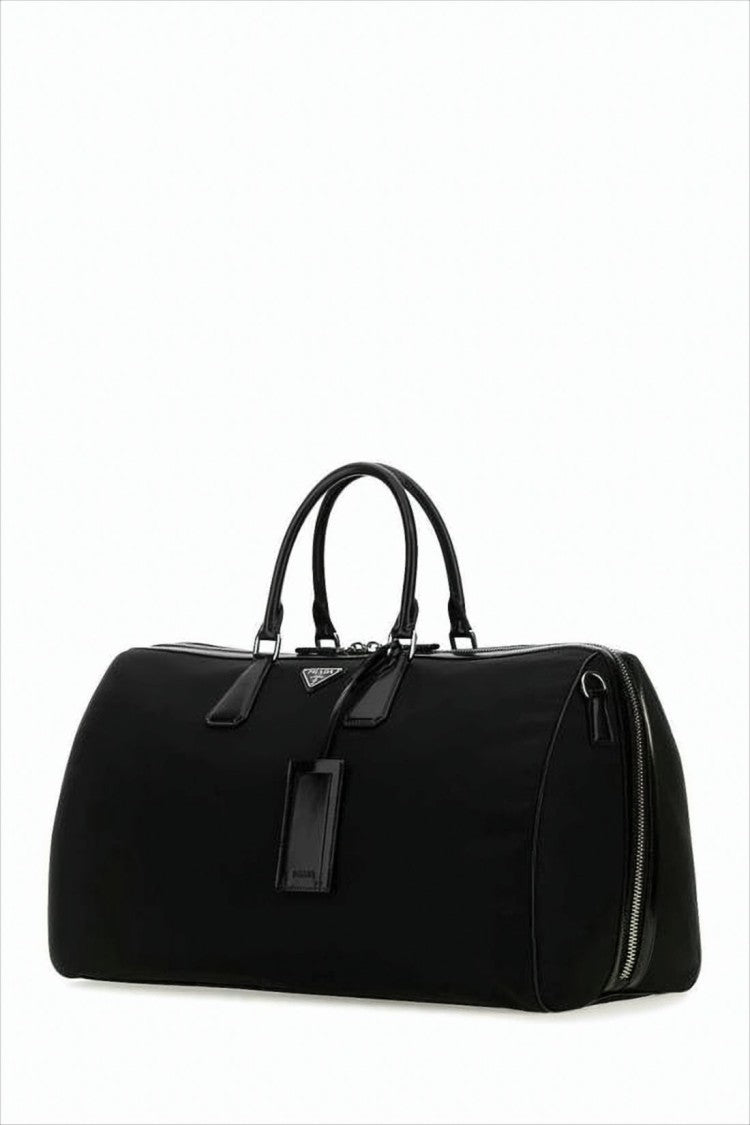 Prada Elongated Duffle Bag With Leather Accents And Triangular Logo
