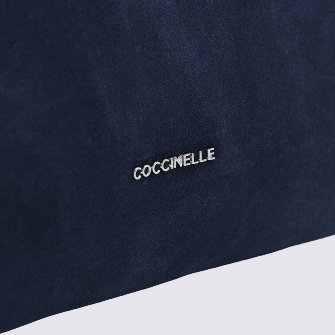 Coccinelle Suede Handbag With Braided Handle And Minimalist Design