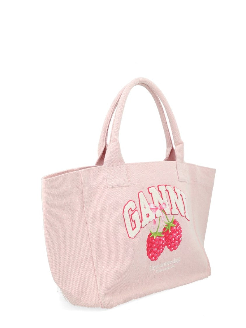 Ganni Raspberry Graphic Light Pink Background Tote Bag