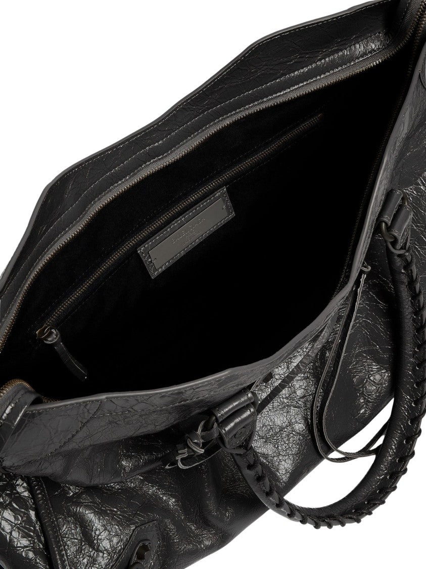 Balenciaga Textured Leather Travel Bag With Removable Charm And Adjustable Strap