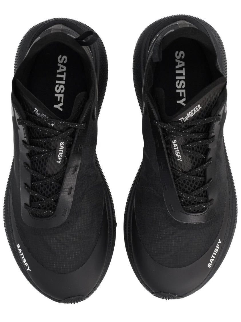 Satisfy Streamlined Black Sneakers With Rugged Tread And Textural Details