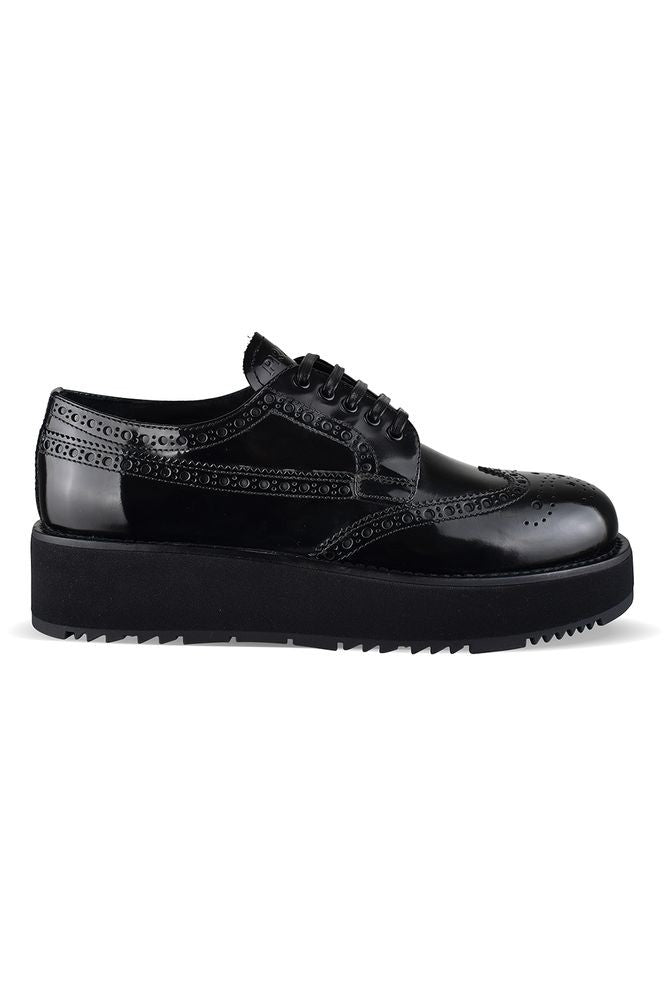 Prada Brogue Derby Shoes In Black Patent Leather