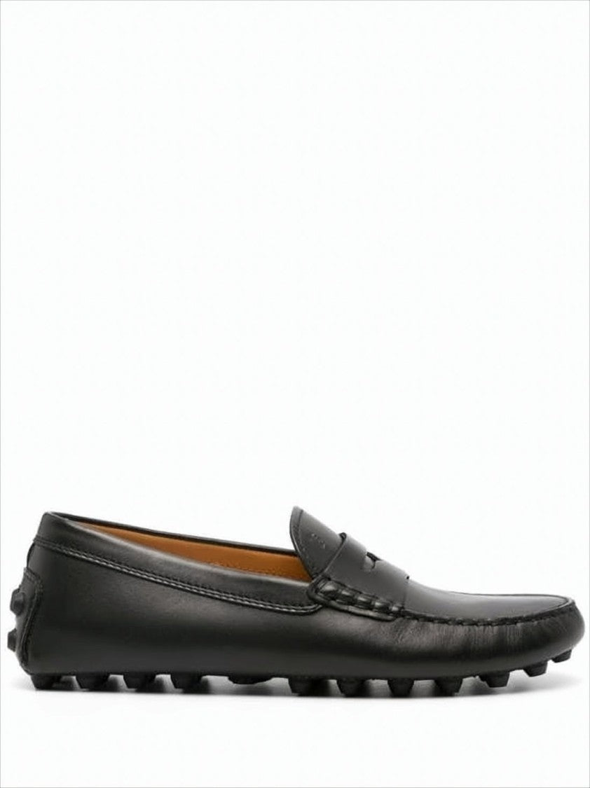 Tod's Penny Strap Black Leather Loafer With Pebbled Sole