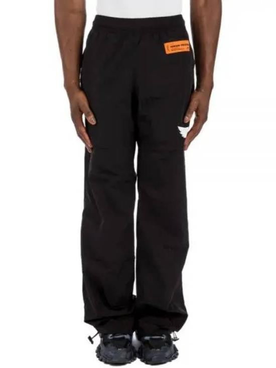 Heron Preston Relaxed Fit Straight Pants With Adjustable Cuffs