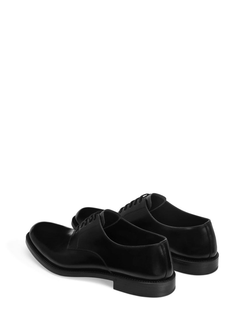 Dolce & Gabbana Streamlined Black Leather Lace-Up Flat Shoes