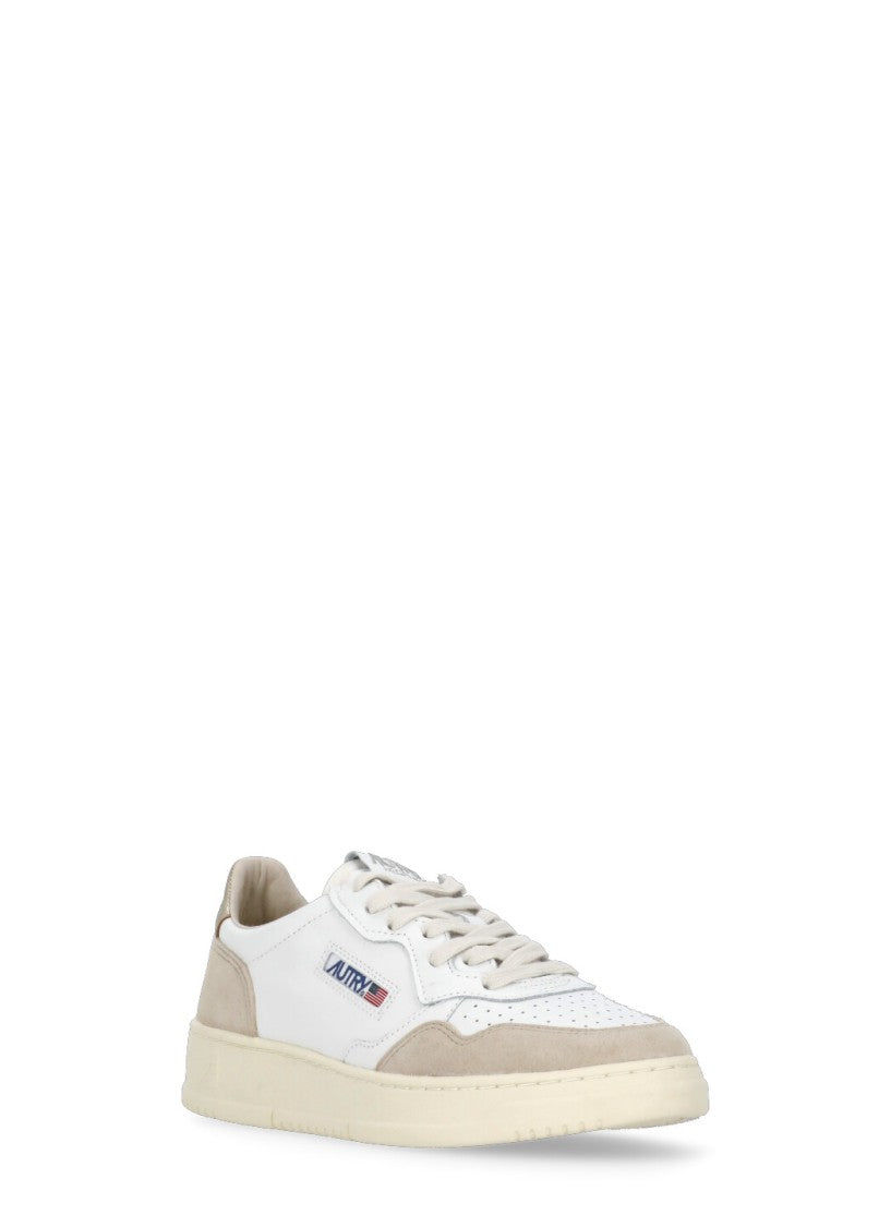 Autry White Smooth Leather Golden Accent Sneakers