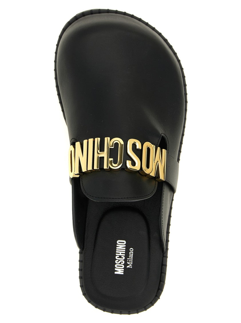 Moschino Black Leather Sabots With Bold Logo Strap
