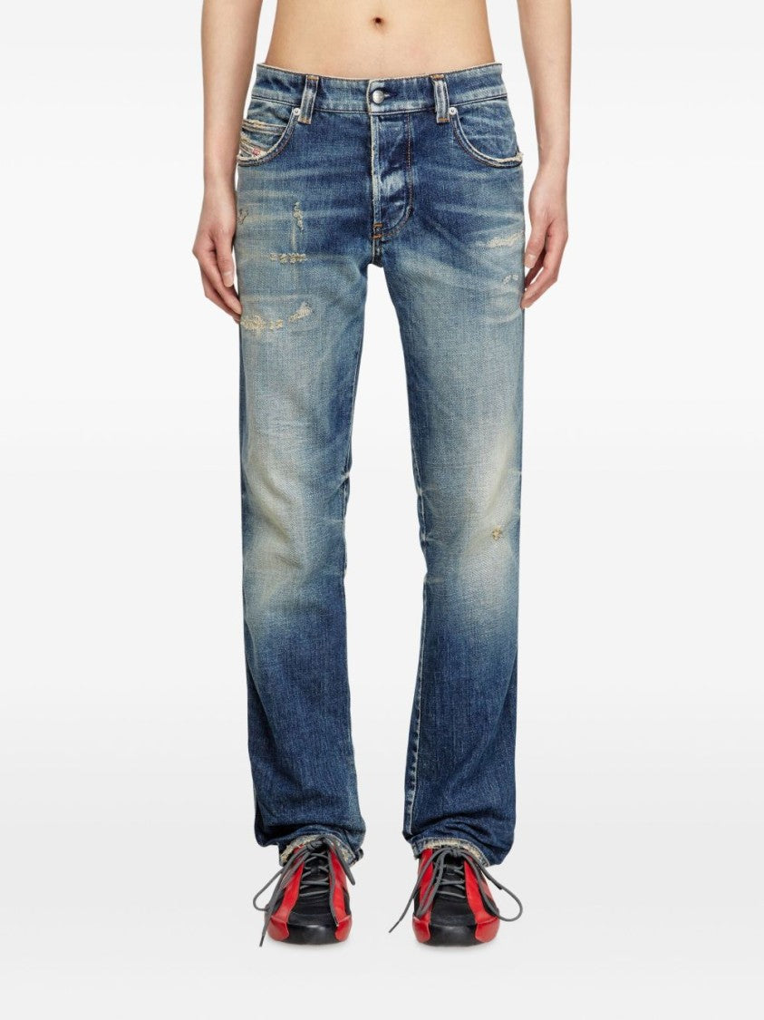 Diesel Relaxed Fit Faded Blue Jeans With Vintage Distressing