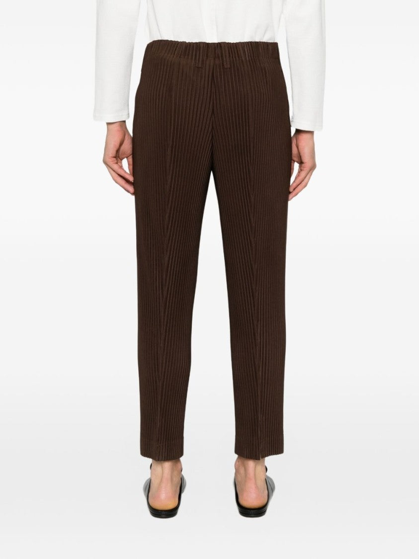 Homme Plissé Issey Miyake Textured Pleated Trousers With Straight-Leg Silhouette