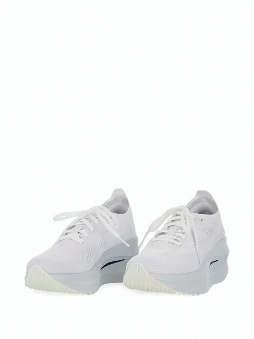 Comme Des Garçons Minimalist White Sneakers With Sculpted Sole