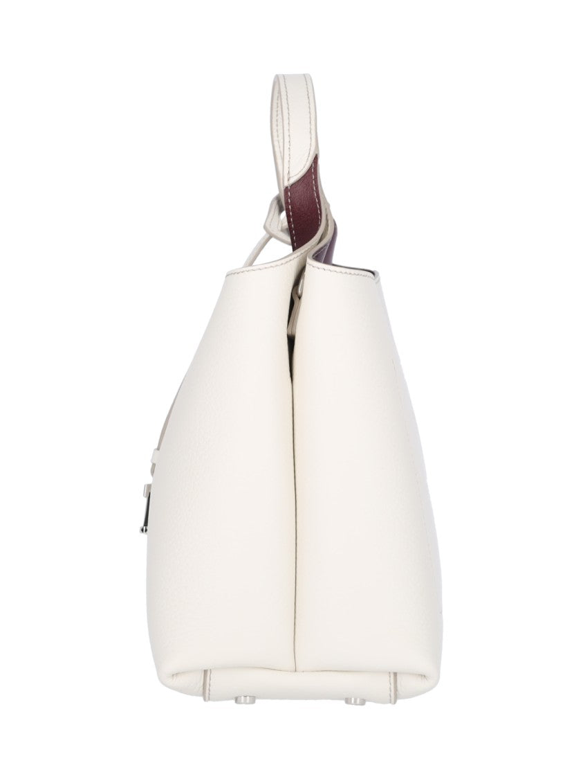 Tod's Textured White Leather Handbag With Silver Charm