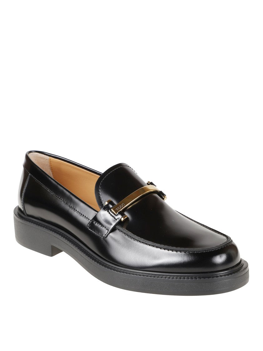 Tod's Polished Black Leather Flats With Gold-Tone Accent