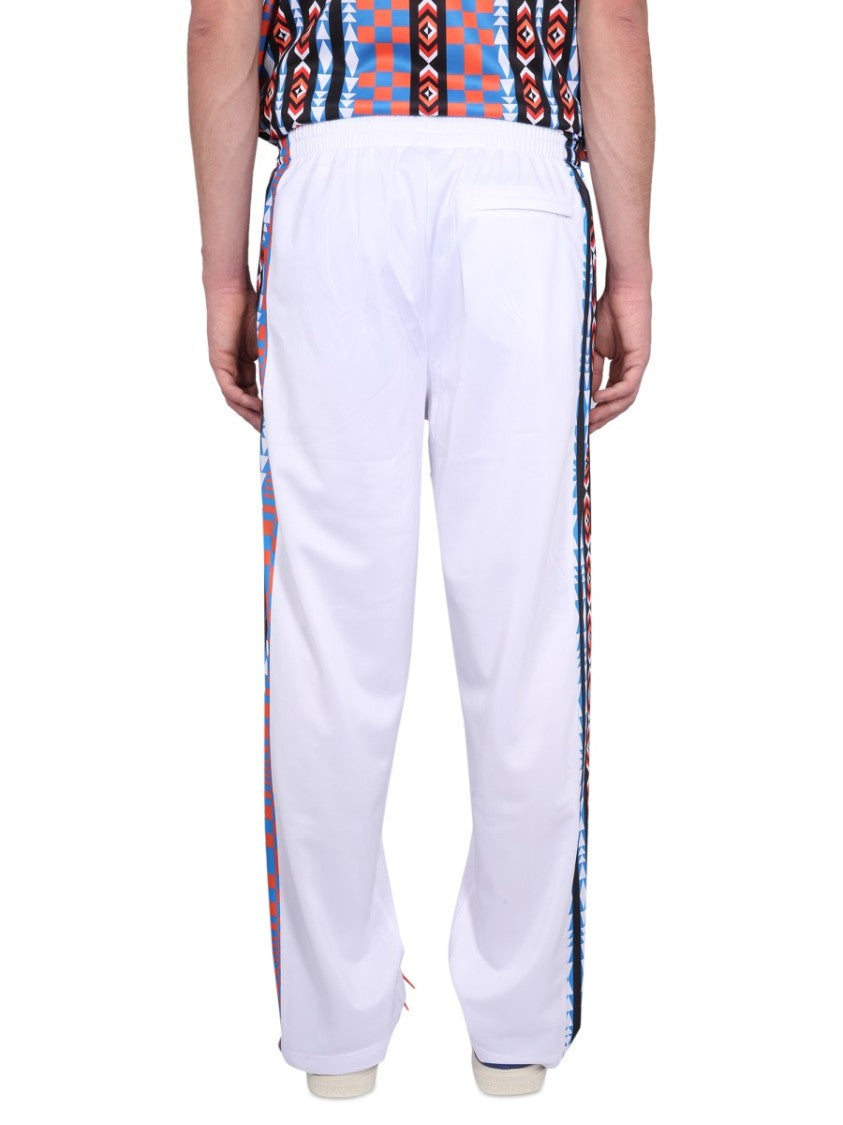 Marcelo Burlon Jogging Pants With High Neck And Zipper Closure