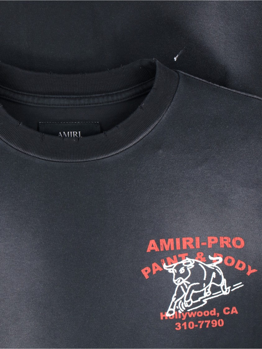 Amiri Short-Sleeve T-Shirt With Vintage Graphic And Distressed Finish