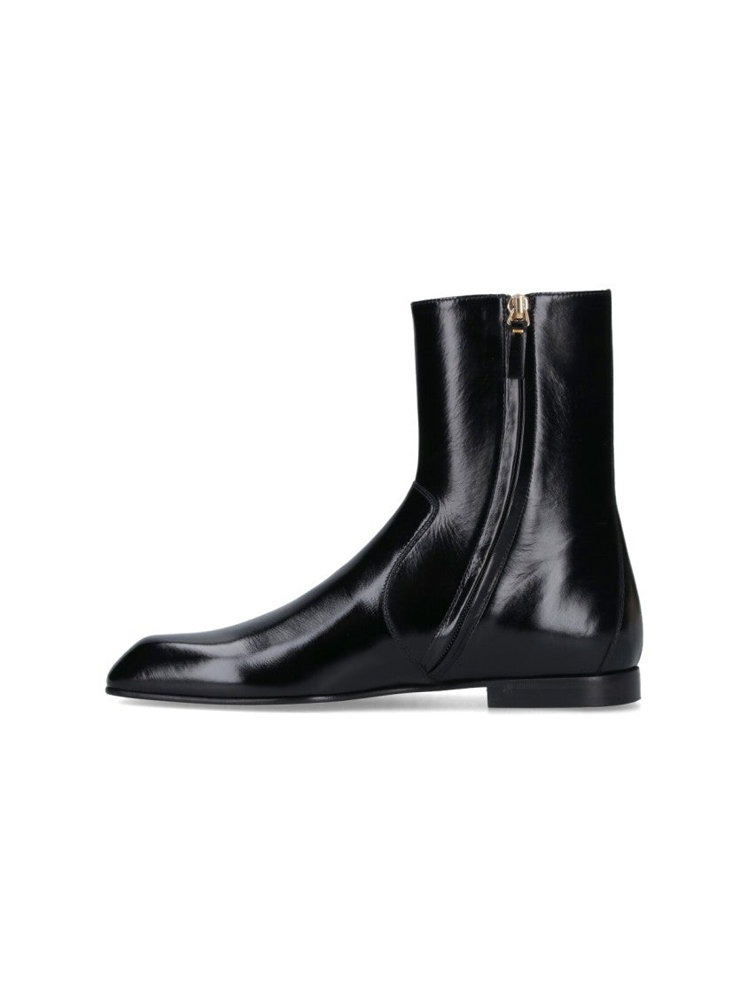 Khaite Sophisticated Black Calf Leather Ankle Boot With Gold Hardware