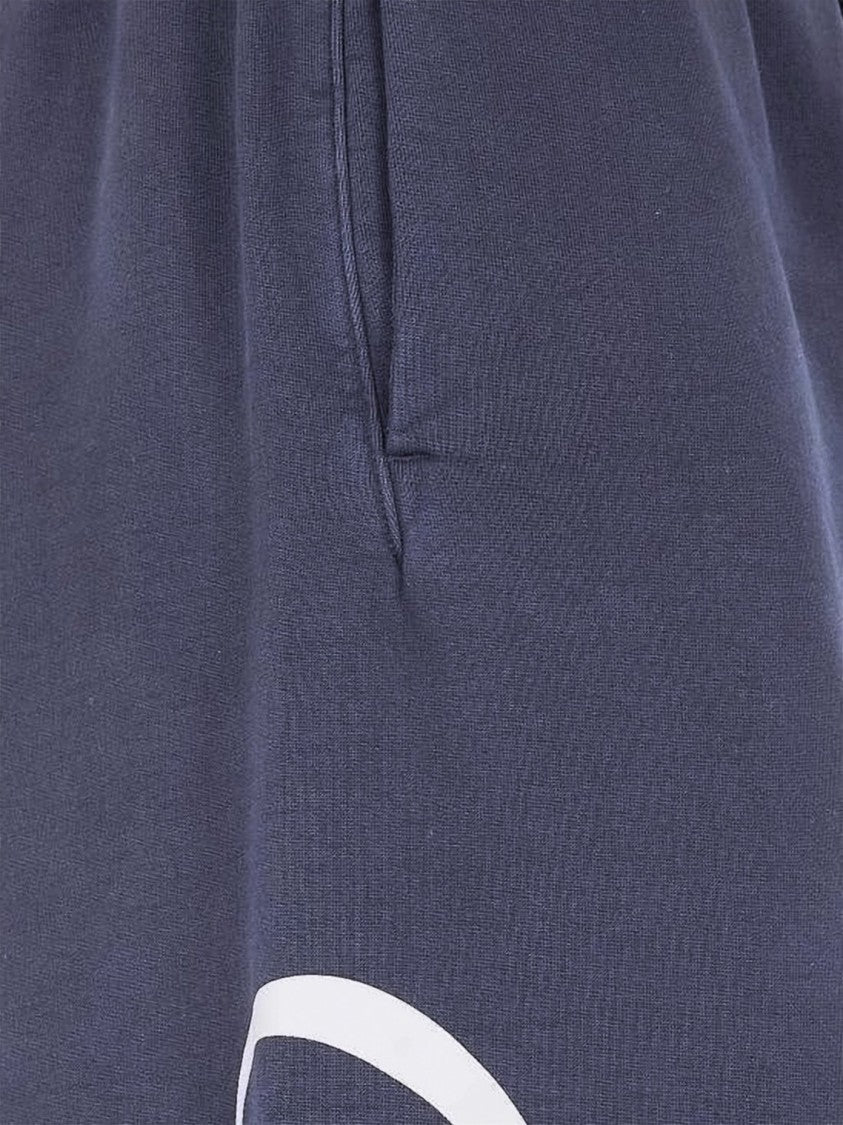 Fear Of God Cropped Blue Cotton Pants With Bold Graphic Print