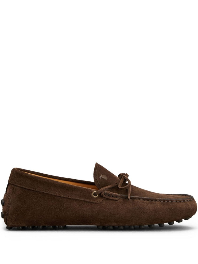 Tod's Moccasin Toe Loafers With Decorative Bow And Rubber Pebble Sole