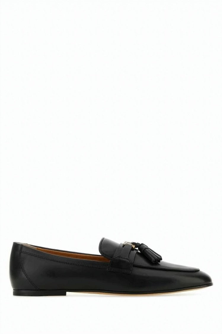 Tod's Pointed-Toe Loafer With Decorative Tassels And Polished Finish