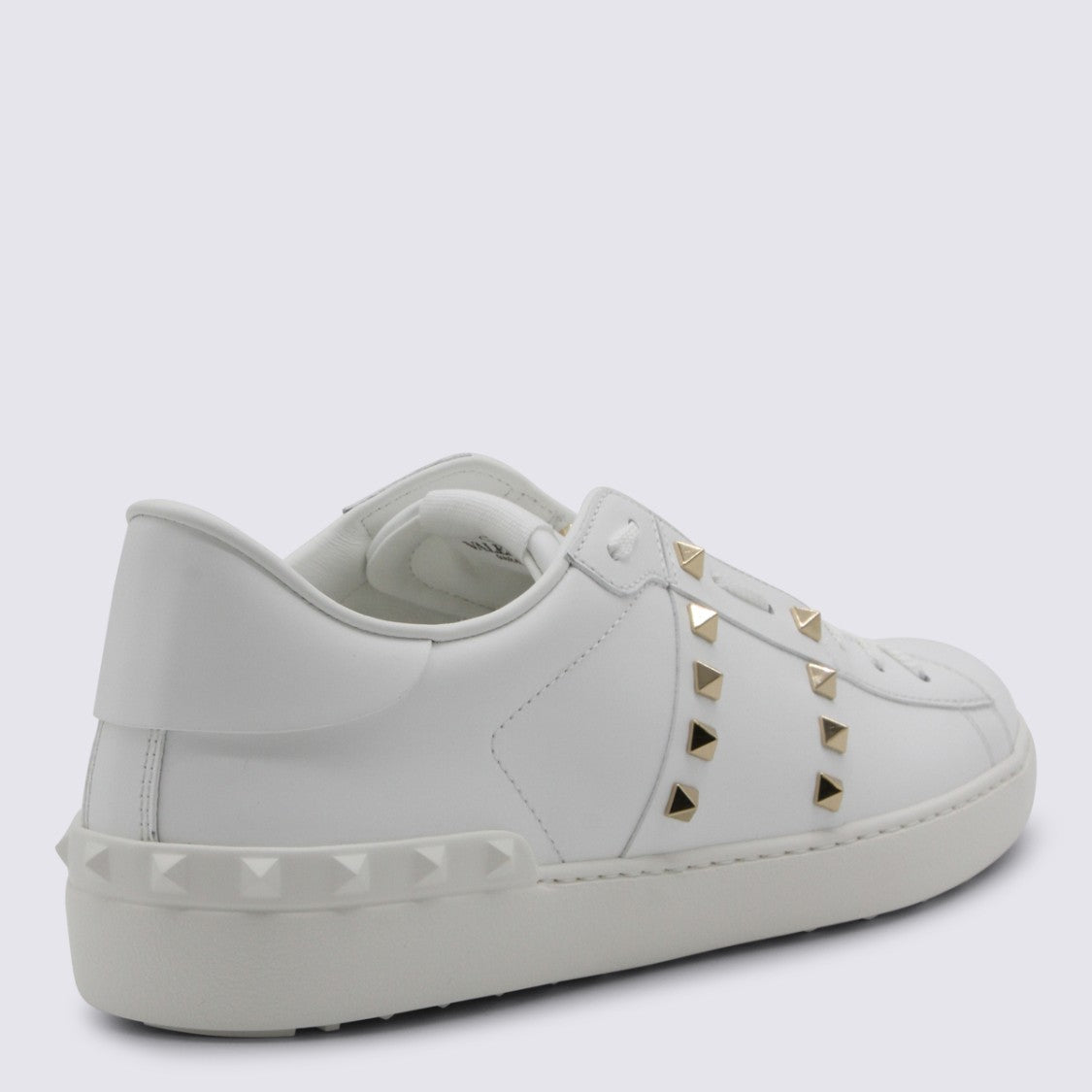 Valentino Garavani Low-Top Sneakers With Gold-Tone Pyramid Studs